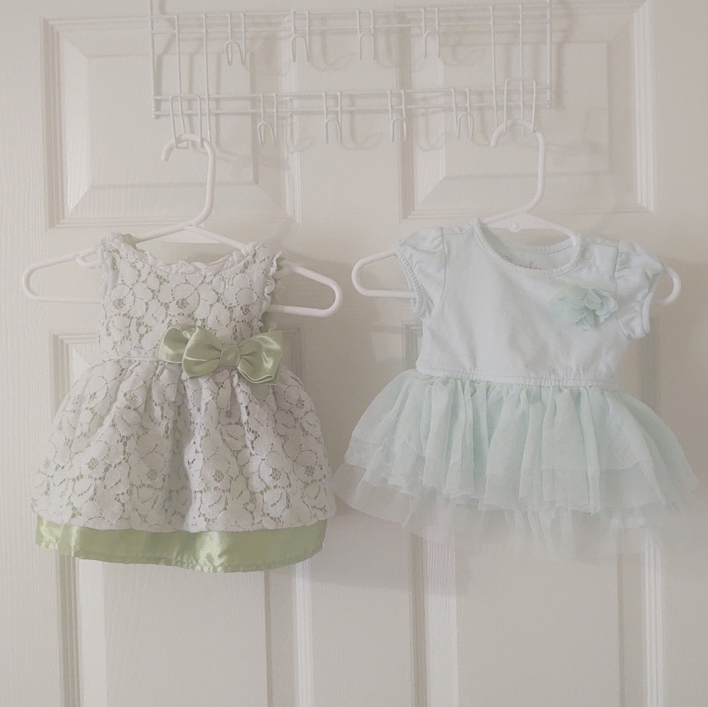 Two beautiful green and blue 0-3 month dresses